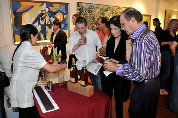 Guests enjoying the Atlantico Bar at the William Chewning Preview & Atlantico Rum Cocktail Party. Photo credit Manny Hernandez (14)