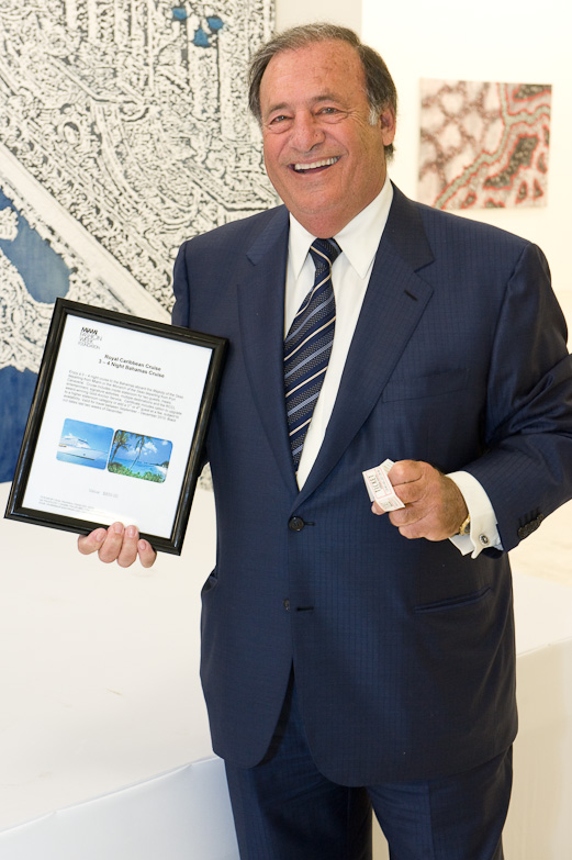 Winner Jeff Berkowitz photographed with his prize courtesy of Stella Artois at Miami International Fashion Week Kick-off party co-hosted by Tiffany & Co. 2